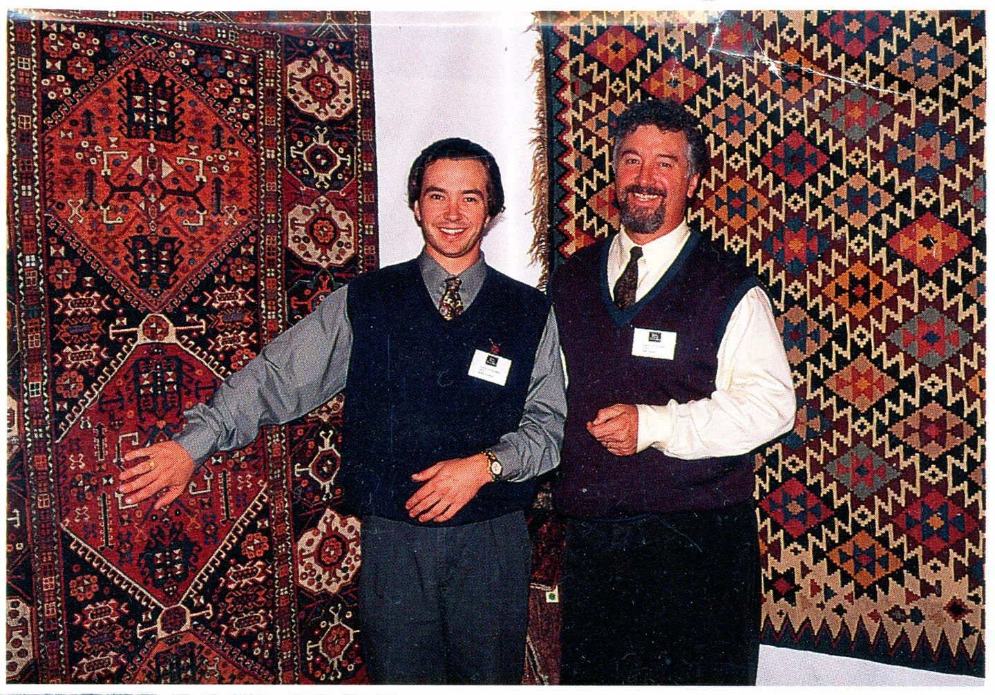 An exhibition booth of antique tribal rugs and weavings