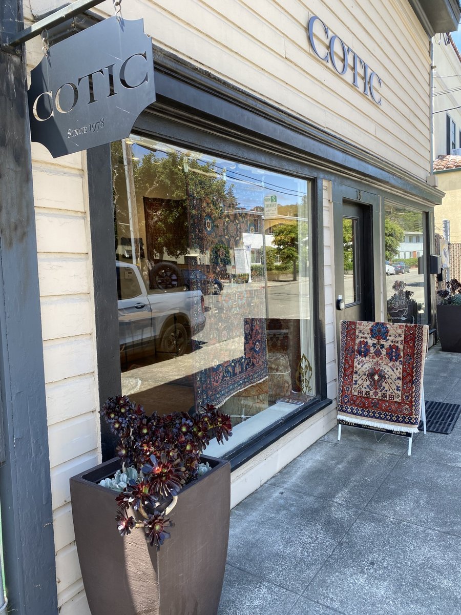 The Carpets of the Inner Circle storefront on Ross Avenue in San Anselmo, with antique rugs in the window and the since-1978 sign